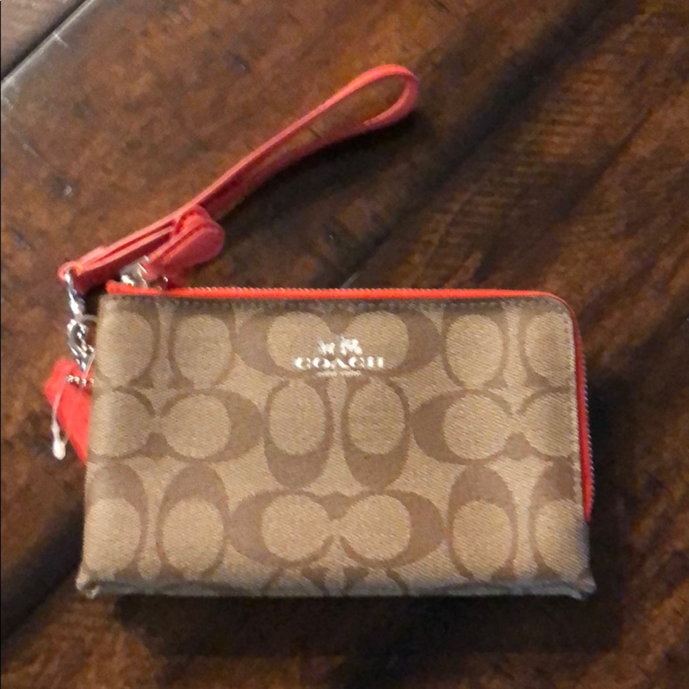 EUC Coach Wristlet - used once - orange details